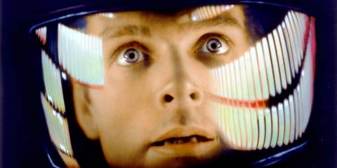 an extreme close-up of Bowman with his space helmet on in 2001: A Space Odyssey