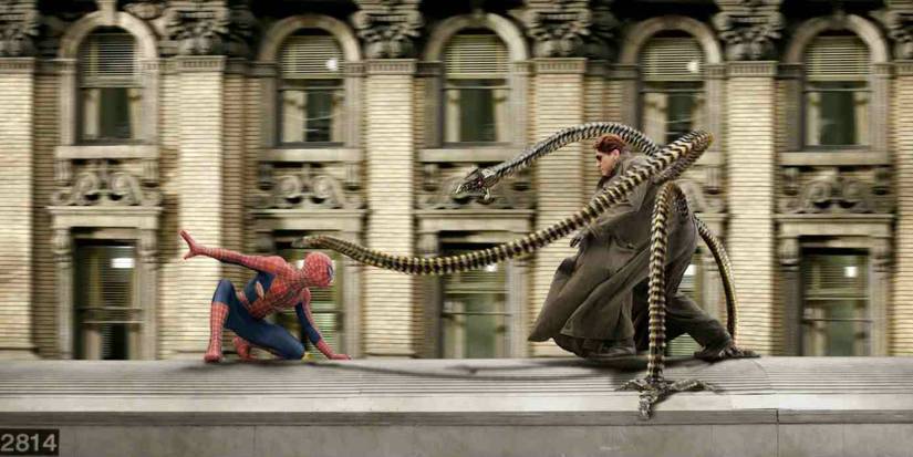 Tobey Maguire and Alfred Molina as Spider-Man and Doc Ock fight on top of a train in Spider-Man 2
