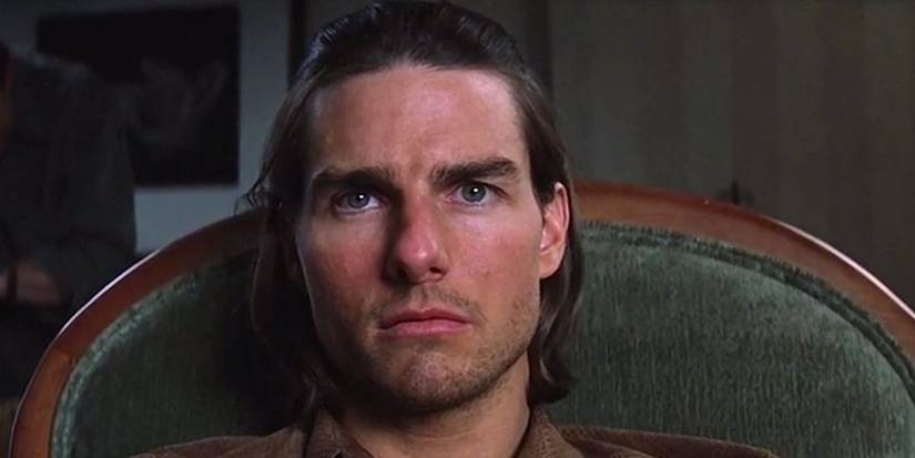 Tom Cruise as Frank T.J. Mackey staring during an interview in Magnolia 