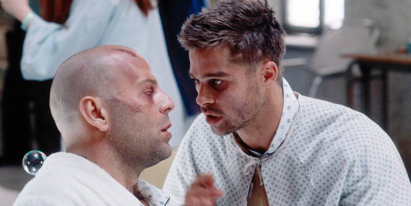 Bruce Willis and Brad Pitt talking in a hospital in Twelve Monkeys.