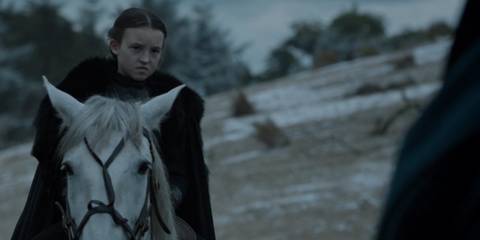 Lyanna Mormont grimacing on horseback in Game of Thrones season 6's Battle of the Bastards