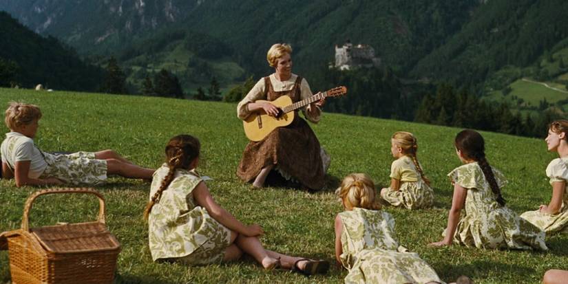 Maria (Julie Andrews) singing Do Re Mi to the Von Trapp kids in a field in The Sound Of Music