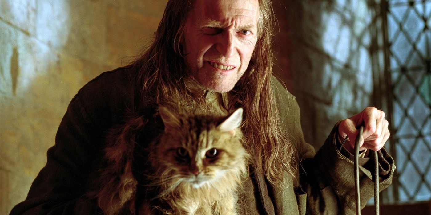 Argus Filch and Mrs Norris in Harry Potter
