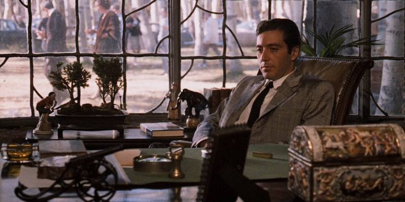 Michael Corleone (Al Pacino) sitting at his desk in The Godfather Part II (1974).