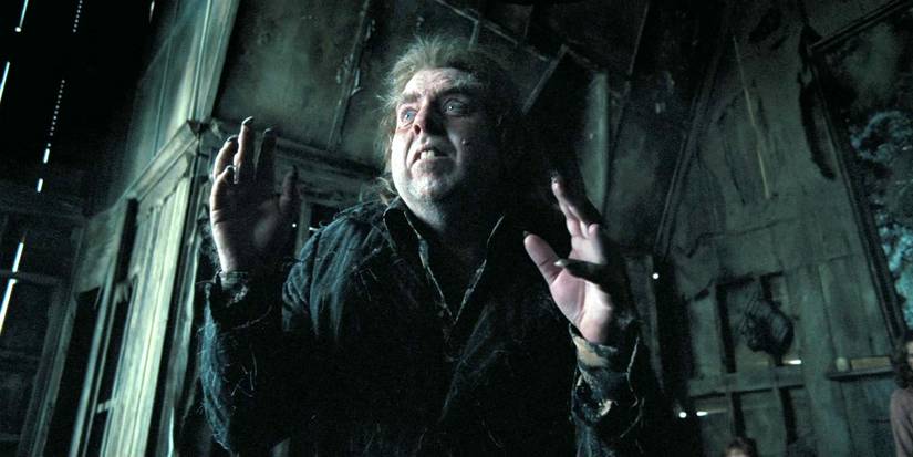 Timothy Spall as Peter Pettigrew standing in fear in Harry Potter and the Prisoner of Azkaban.