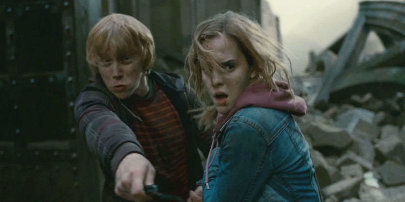 Rupert Grint como Ron Weasley e Emma Watson como Hermione Granger