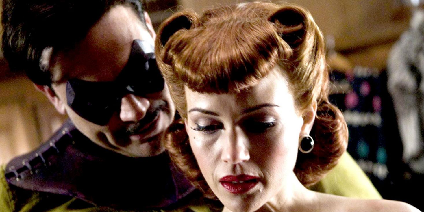 Cena de Watchmen envolvendo Silk Spectre e O Comediante.