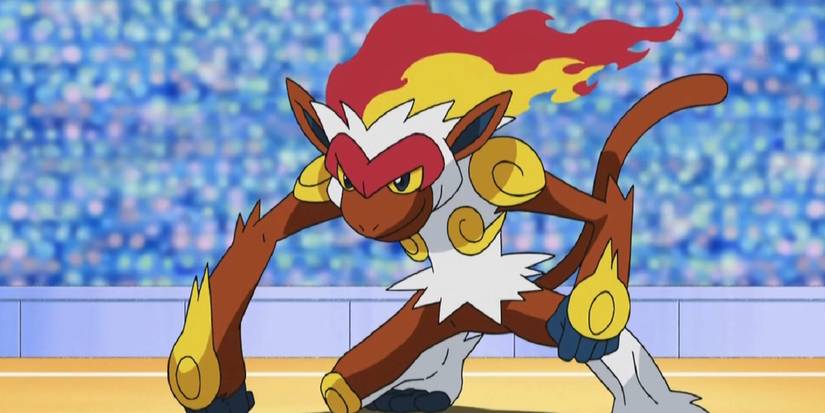 Ash's 10 Strongest Pokémon 6 Infernape leans to the ground ready to fight in Pokemon anime.