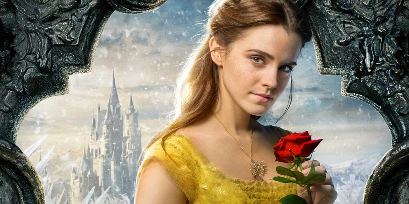 Emma Watson as Belle holding a rose and looking at the camera in a Beauty and the Beast cropped promotional poster