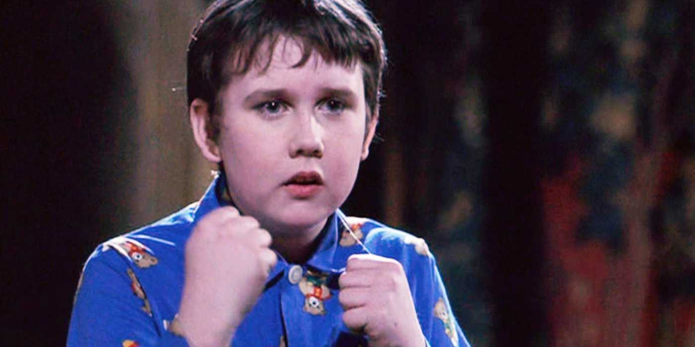 Neville holding up his firsts in Harry Potter and the Sorcerer's Stone