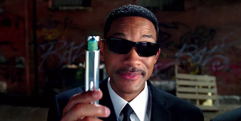 Will Smith holding a Neuralyzer in Men in Black