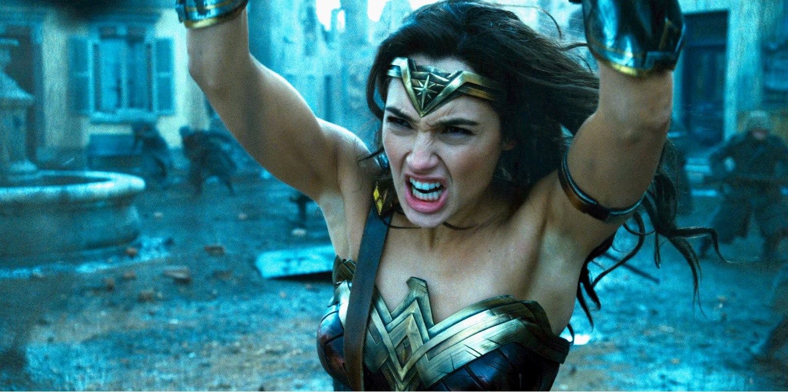 Gal Gadot raising her arms as Wonder Woman