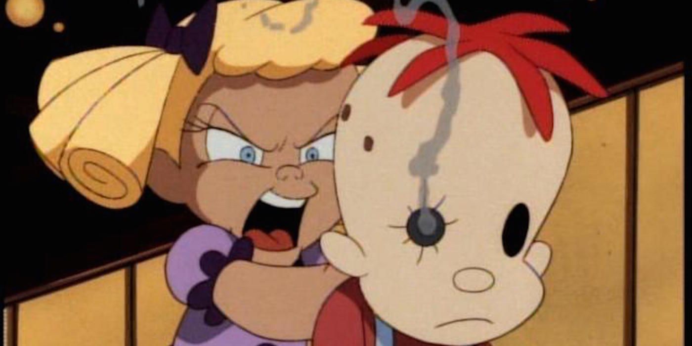 Baby Doll holding a gun behind a toy doll in Batman The Animated Series