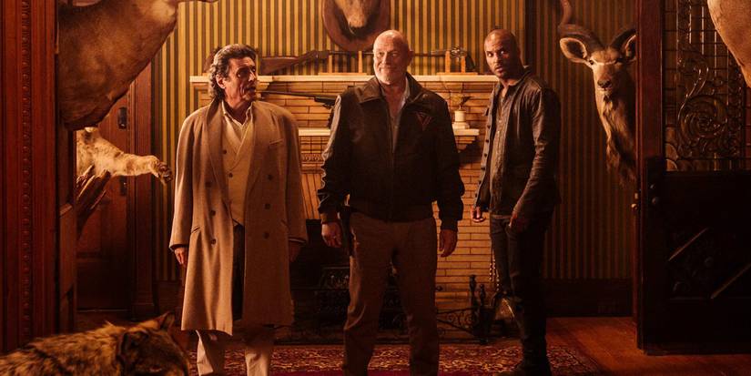 Mr Wednesday, Vulcan, and Shadow Looking Perplexed in American Gods Season 1 