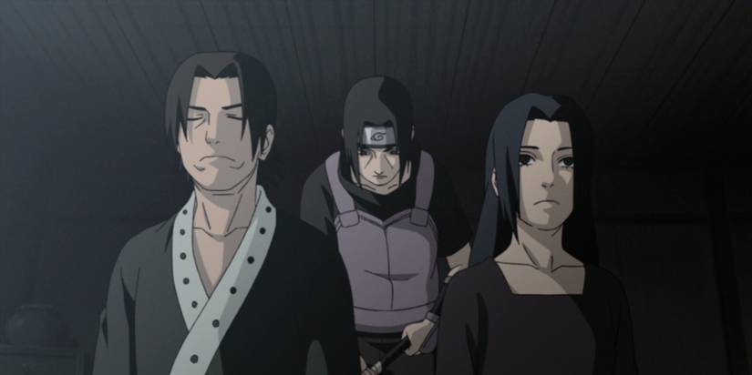 Image of Itachi standing behind Fugaku and Mikoto trying to kill them