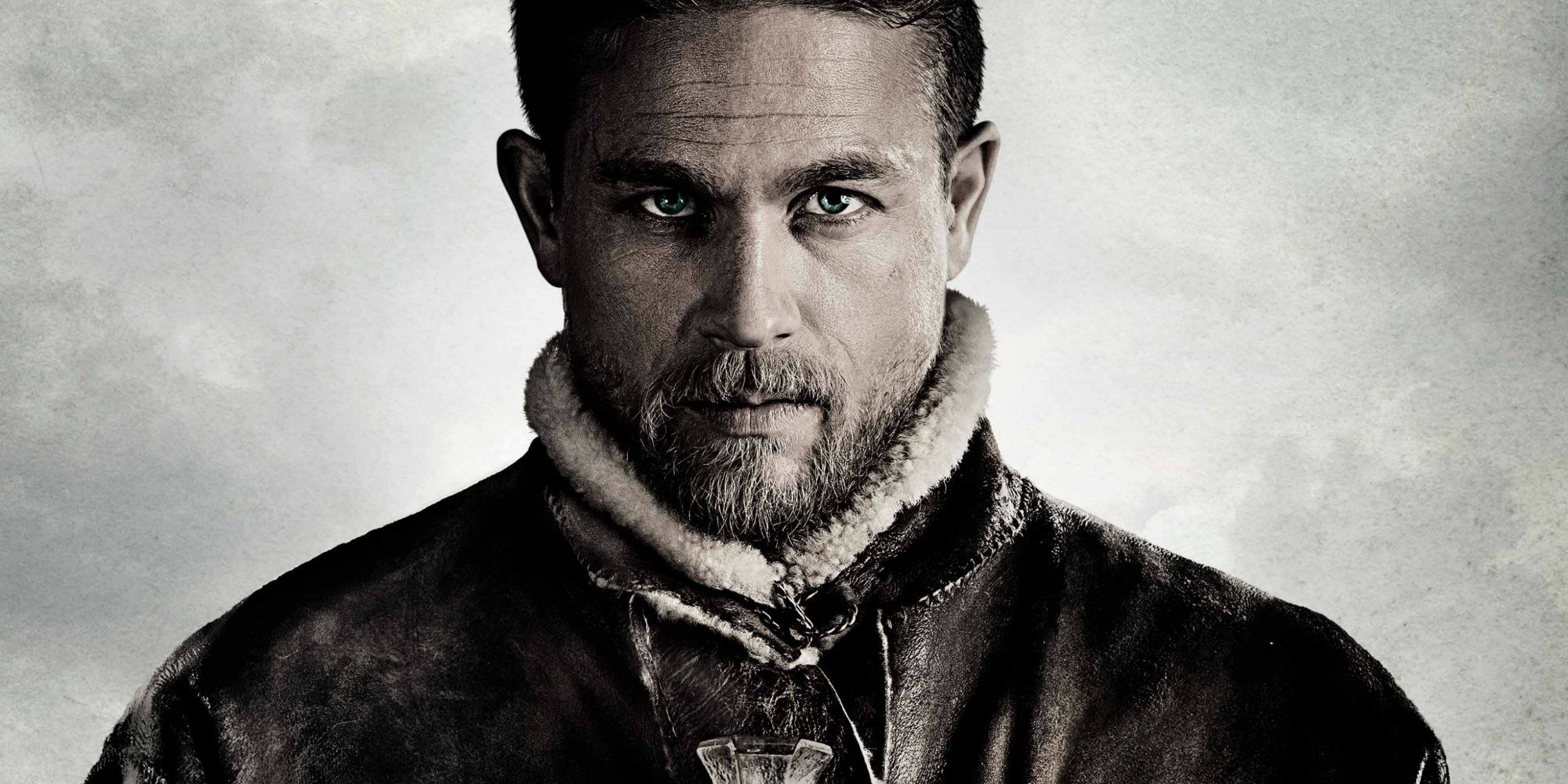 King Arthur Legend of the Sword Poster with Arthur (Charlie Hunnam) staring.