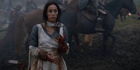 Oona Chaplin as Talisa, covered in blood on a battlefield in Game of Thrones