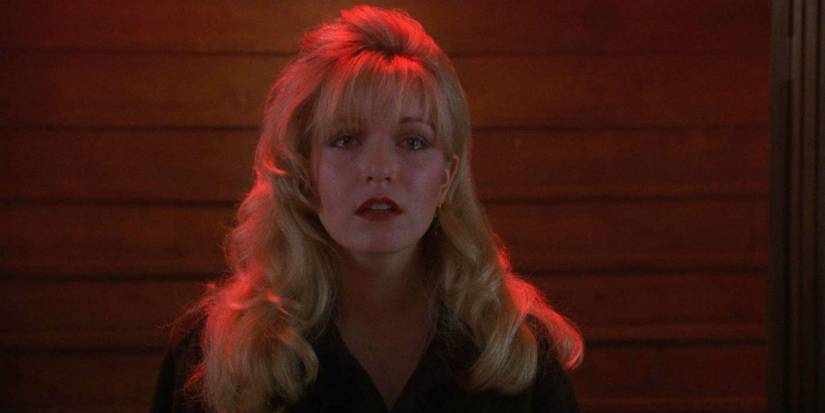 Laura Palmer (Sheryl Lee) looking distraught at something off-camera in Twin Peaks