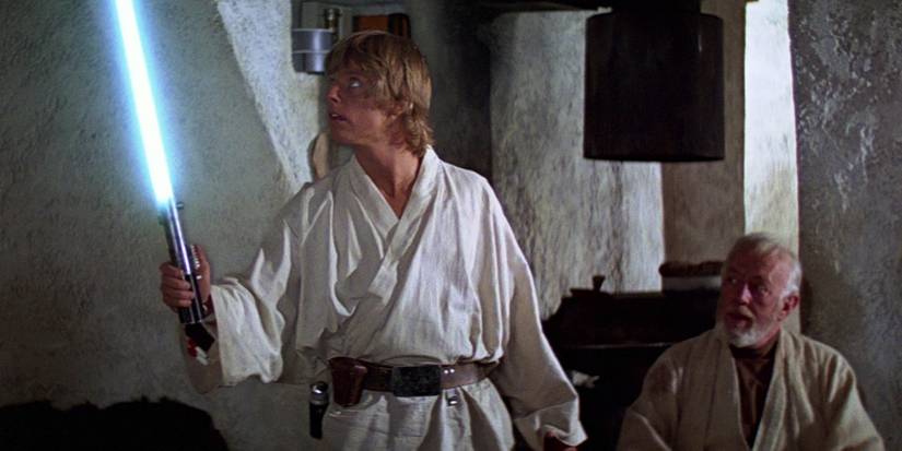 Mark Hamill como Luke Skywalker e Alec Guinness como Obi-Wan Kenobi em Star Wars