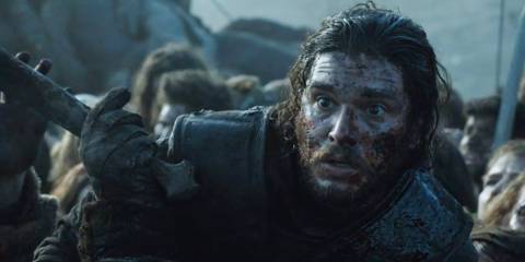 Jon Snow covered in blood looking horrified in the Battle of the Bastards