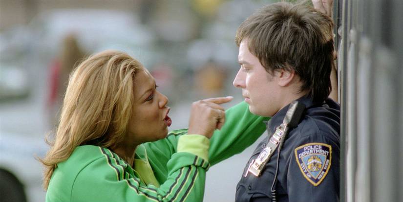 Queen Latifah as Belle accosts Jimmy Fallon as Detective Andrew Washburn in Taxi