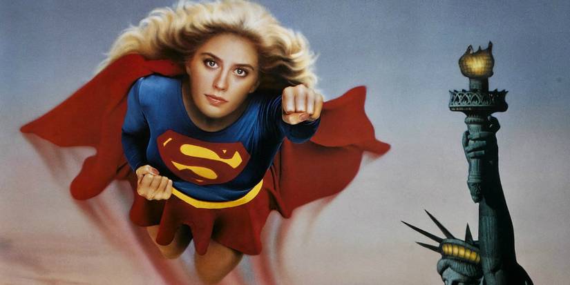Supergirl flies forward in a Supergirl (1984) poster.