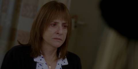 Joan Ramsey looking distressed in American Horror Story