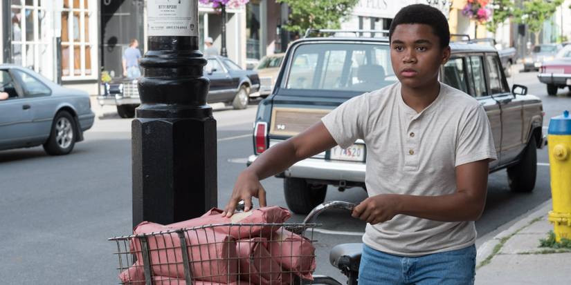 Mike Hanlon (Chosen Jacobs) delivering on his bike in IT