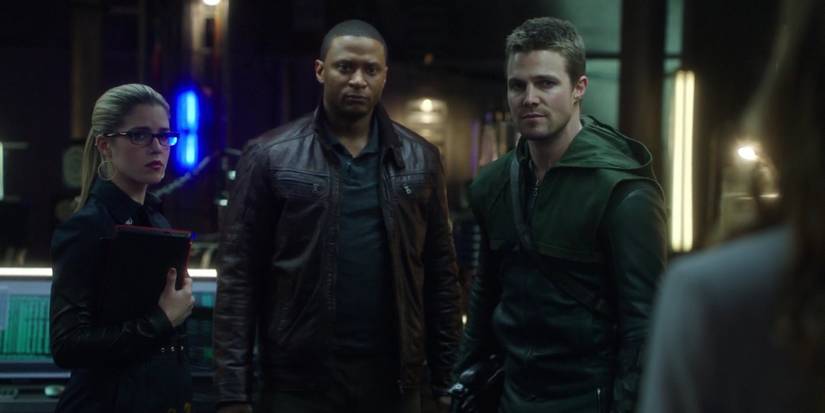 John, Oliver and Felicity in their base