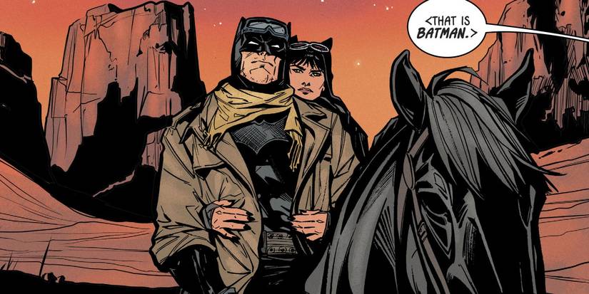 Batman and Catwoman ride through the desert on a horse in a DC Comic