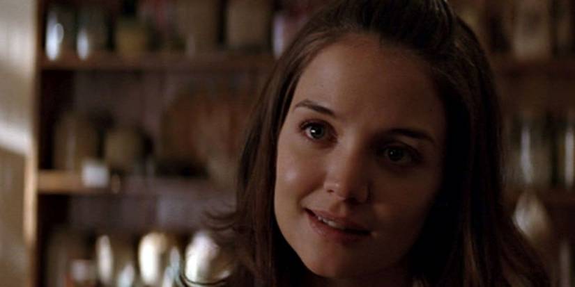 Katie Holmes smiles as Rachel Dawes in Batman Begins