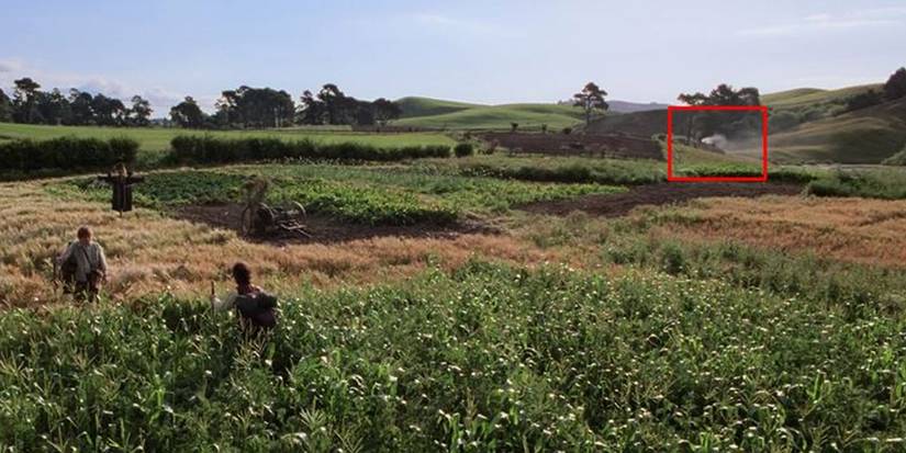 Frodo and Sam in a field in LOTR: The Fellowship Of The Ring