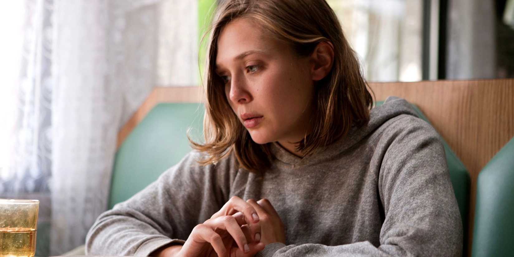 Elizabeth Olsen looking sad in Martha Marcy May Marlene