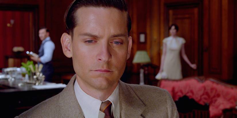 The Great Gatsby's Best Quote Isn't the One Everyone Thinks 6 Tobey Maguire as Nick looking confused in The Great Gatsby