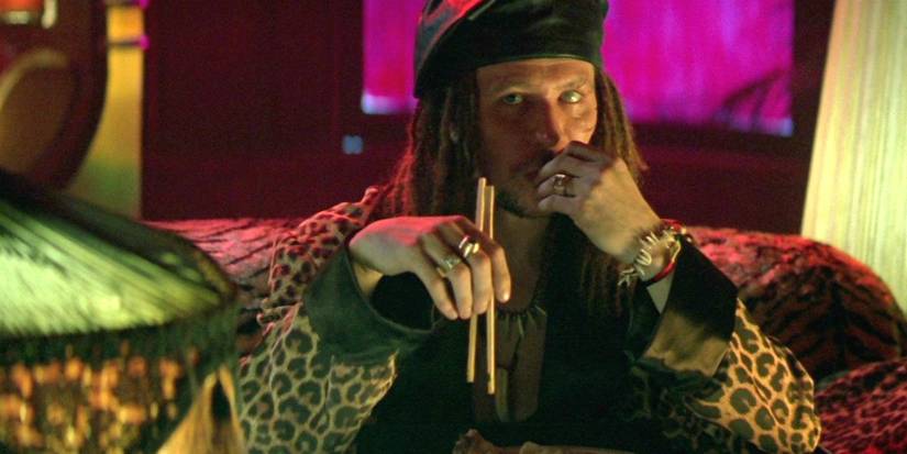 Gary Oldman como Drexl Spivey em Amor à Queima-Roupa