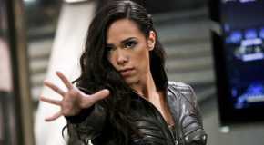 Jessica Camacho plays Gypsy as she raises her hand up in The Flash