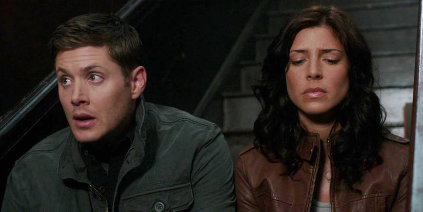 Dean and Lisa sitting awkwardly together in Supernatural.