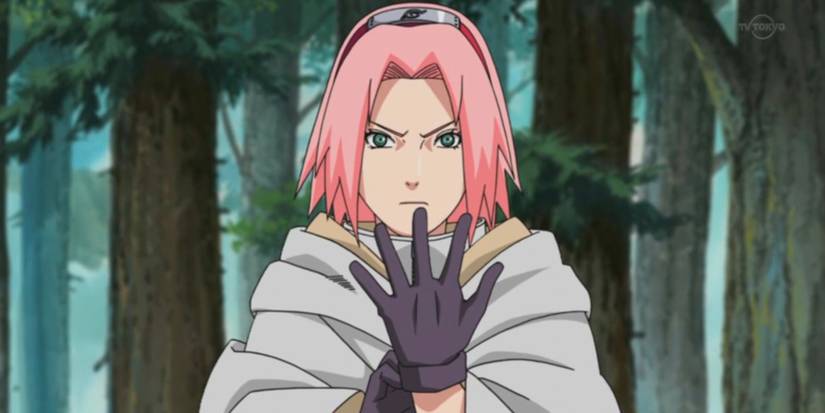 Sakura pulls on her gloves in the woods in Naruto Shippuden
