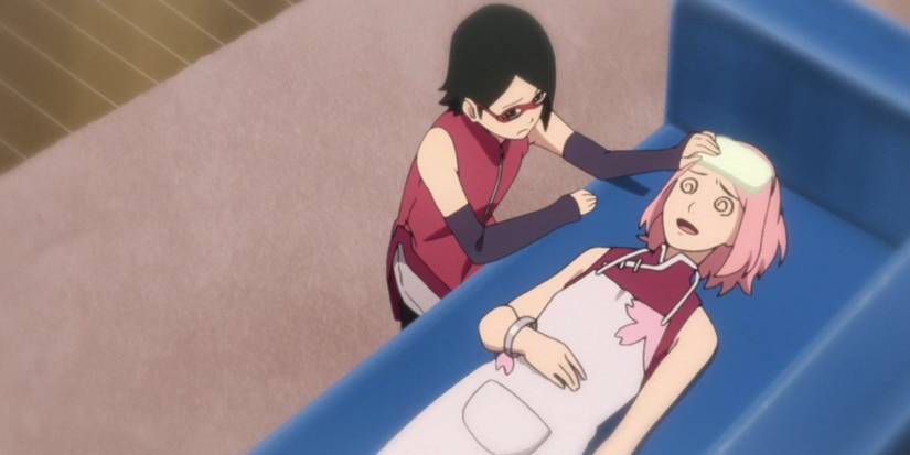 Sarada places a cloth on Sakuras head when she is injured in Boruto