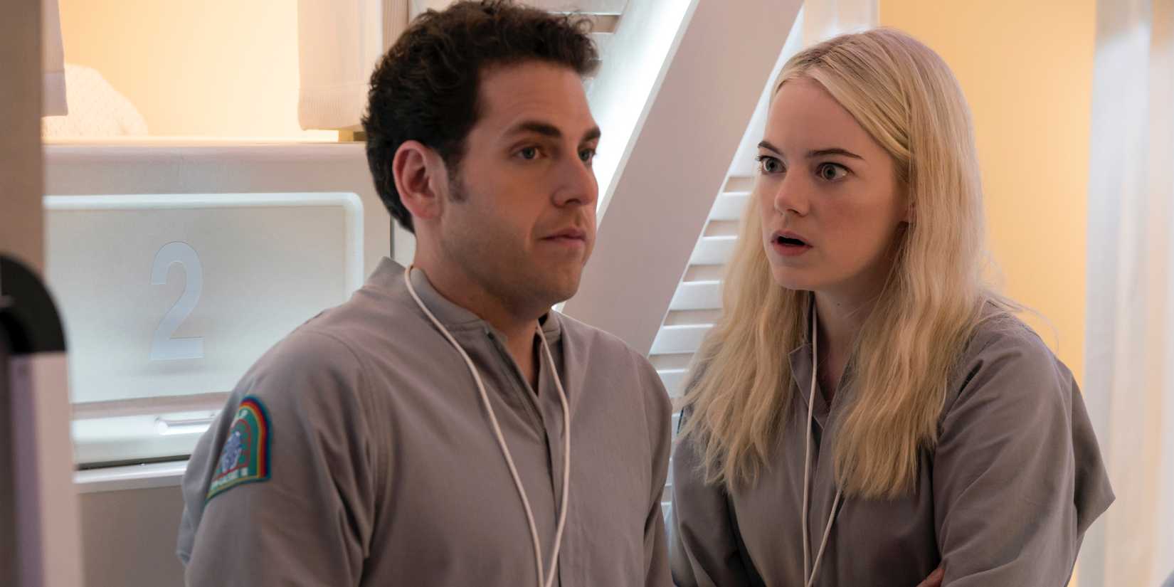 Emma Stone looking shocked at Jonah Hill in Maniac