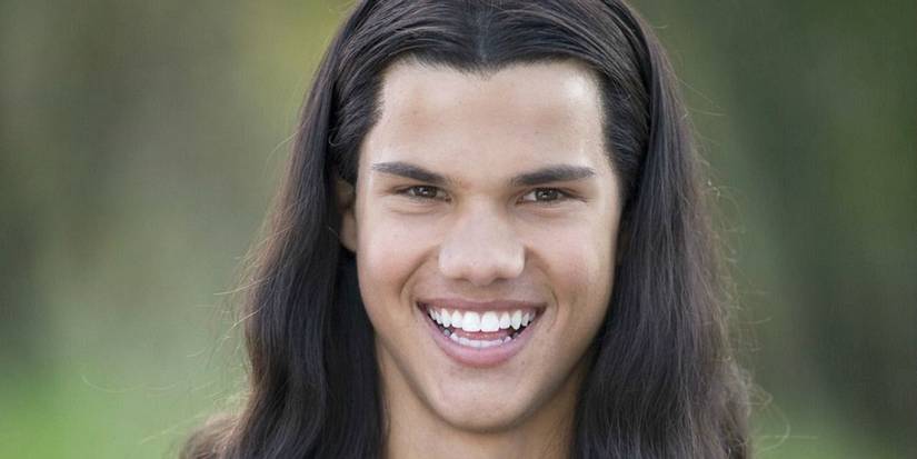 Taylor Lautner as Jacob Black laughing in Twilight.