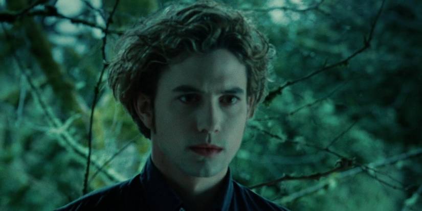 Jackson Rathbone as Jasper Hale in front of the trees in Twilight