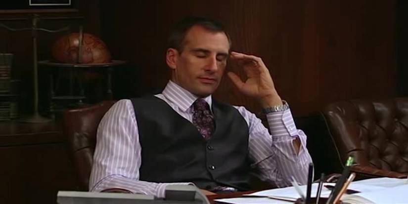 The Lawyer sitting behind his desk and looking frustrated in It's Always Sunny in Philadelphia.
