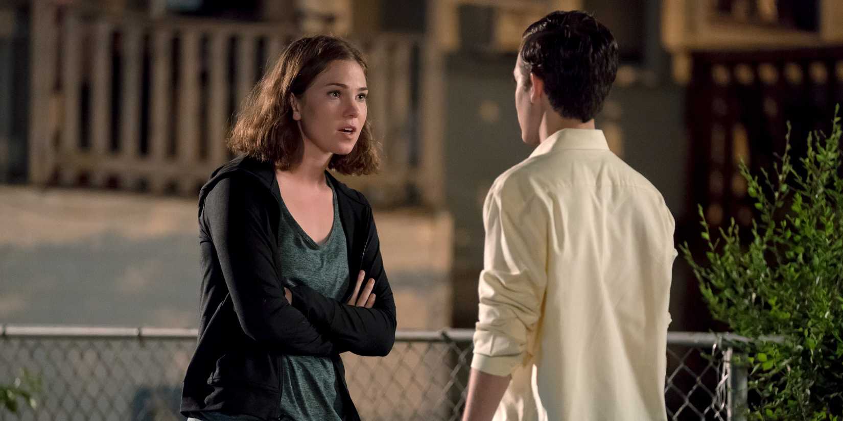 Kelly and Carl talking.