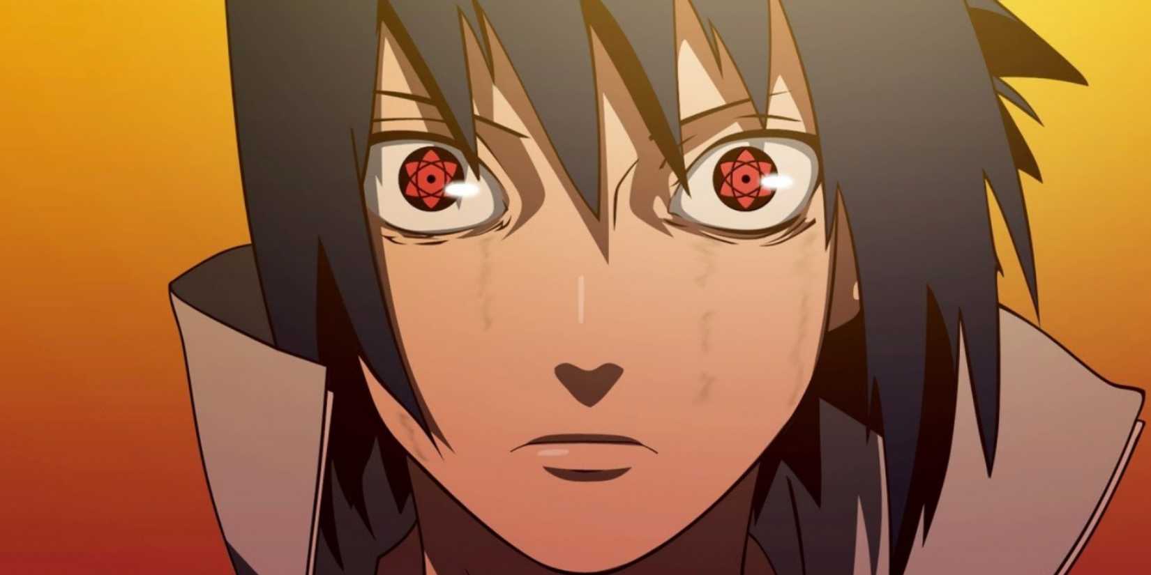 A closeup of Sasuke awakening his Mangekyo Sharingan in Naruto