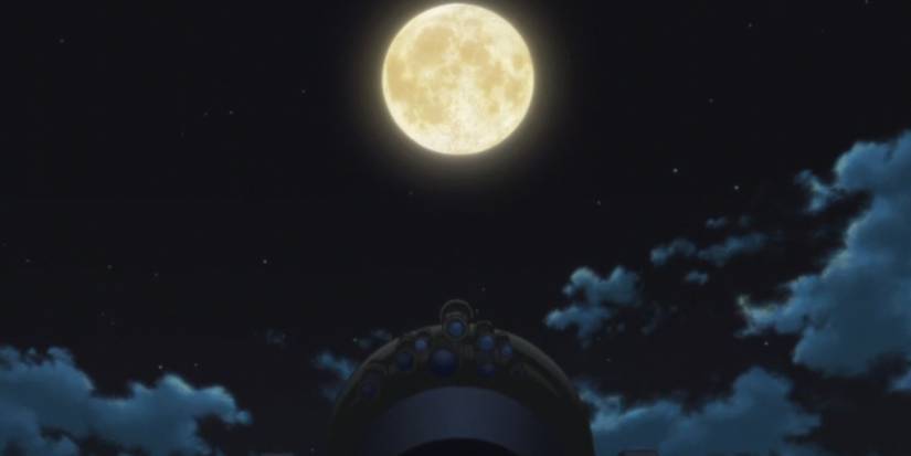 An image of the moon above the tower in The Last Naruto The Movie