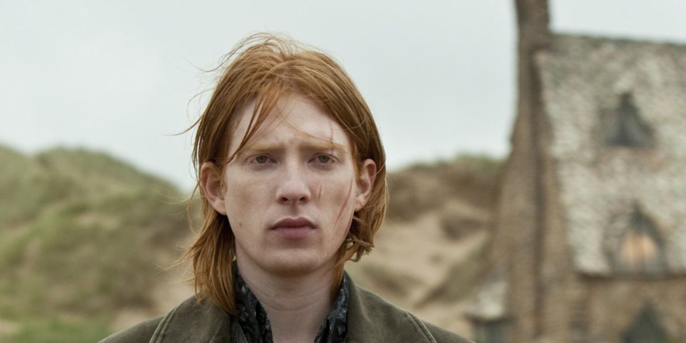 Bill Weasley standing outside his home