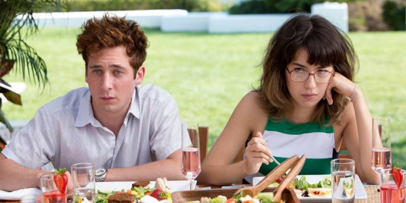 Lip and Amanda sitting together and looking distraught on Shameless