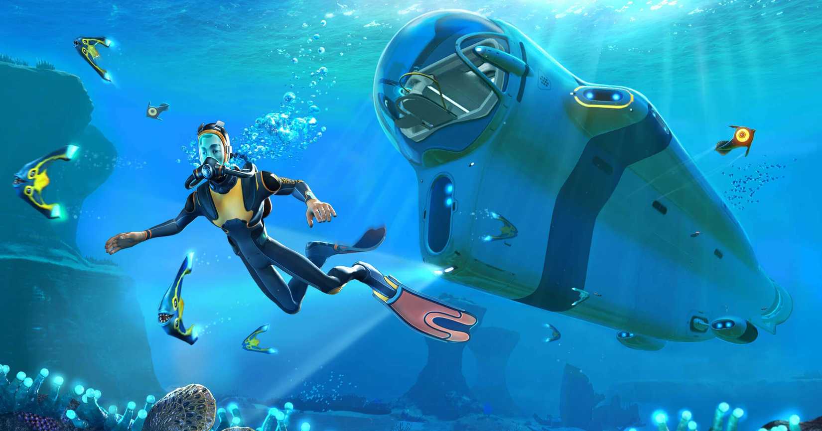 A player character floats beneath the surface next to an arrowhead-shaped submarine and a school of boomerang fish in a screenshot from Subnautica.