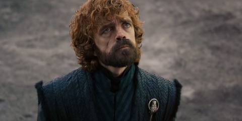 Tyrion looking up, his face serious, in Game of Thrones season 8